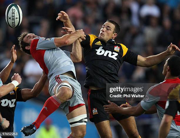 George Whitelock of the Crusaders and Richard Kahui of the Chiefs contest the ball during the round five Super 14 match between the Chiefs and the...
