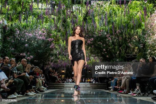 Bella Hadid walks the runway at the Versace show during Milan Men's Fashion Week Spring/Summer 2019 on June 16, 2018 in Milan, Italy.