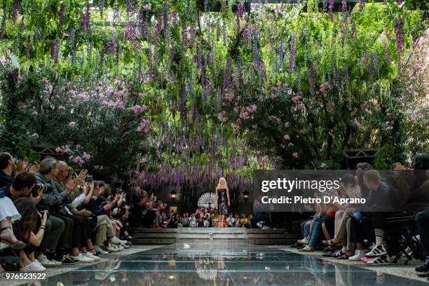 The designer Donatella Versace walks the runway at the Versace show during Milan Men's Fashion Week Spring/Summer 2019 on June 16, 2018 in Milan,...