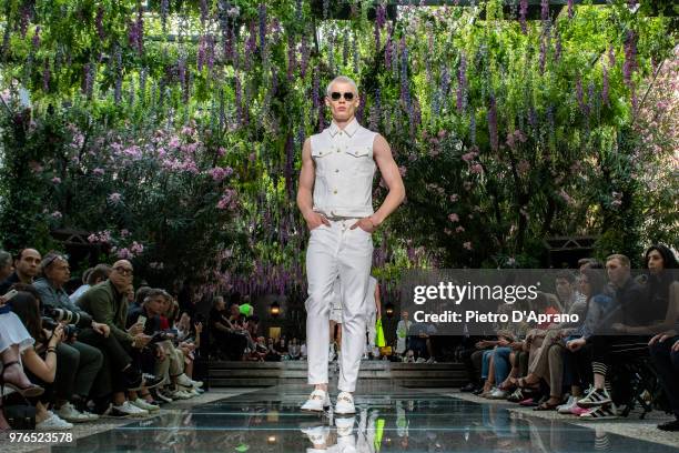 Model walks the runway at the Versace show during Milan Men's Fashion Week Spring/Summer 2019 on June 16, 2018 in Milan, Italy.