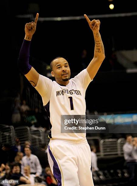 Venoy Overton of the Washington Huskies celebrates after the game with the Oregon State Beavers during the quarterfinals of the Pac-10 Basketball...