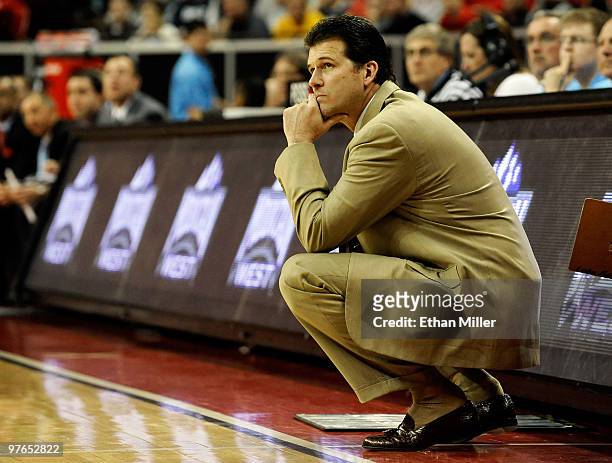 Head coach Steve Alford of New Mexico watches his players during their 75-69 quarterfinal game victory over the Air Force Falcons at the Conoco...