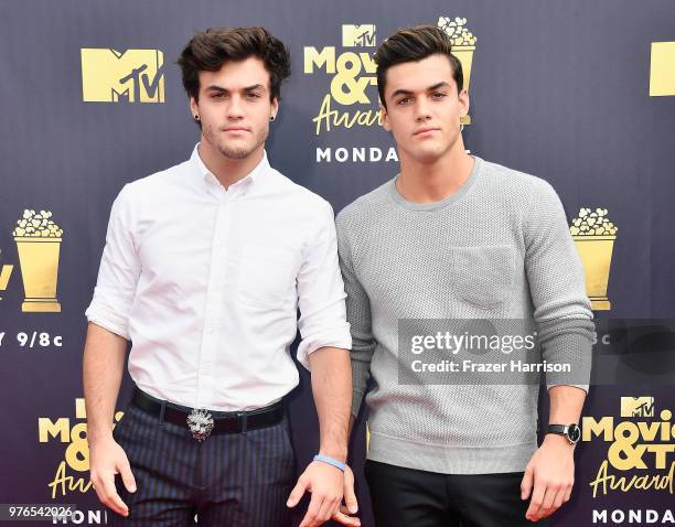 Ethan Dolan and Grayson Dolan attend the 2018 MTV Movie And TV Awards at Barker Hangar on June 16, 2018 in Santa Monica, California.