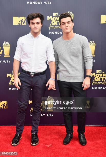 Ethan Dolan and Grayson Dolan attend the 2018 MTV Movie And TV Awards at Barker Hangar on June 16, 2018 in Santa Monica, California.