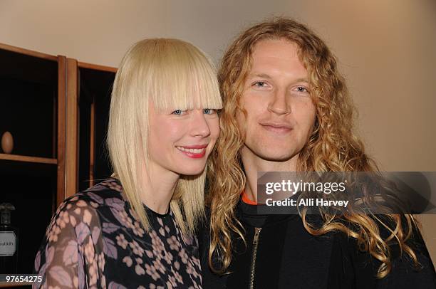 Designer Erin Fetherston and Sam Bassett attend the opening of Lies Maculan's pop-up art installation "The Dream Shop" on March 11, 2010 in New York,...