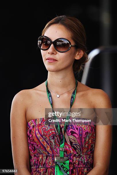 Jessica Michibata, girlfriend of Jenson Button of Great Britain and McLaren Mercedes is seen in the pitlane before practice for the Bahrain Formula...