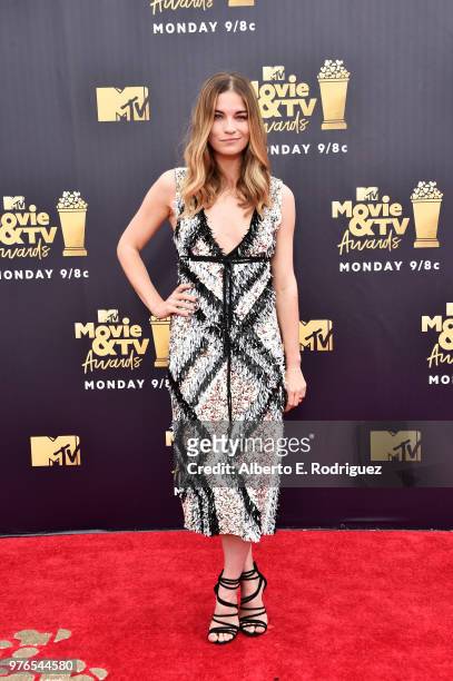 Actor Annie Murphy attends the 2018 MTV Movie And TV Awards at Barker Hangar on June 16, 2018 in Santa Monica, California.