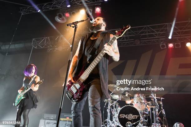 Korey Cooper, John Cooper, and Jen Ledger of Skillet perform live on stage during a concert at Huxleys Neue Welt Berlin on June 16, 2018 in Berlin,...