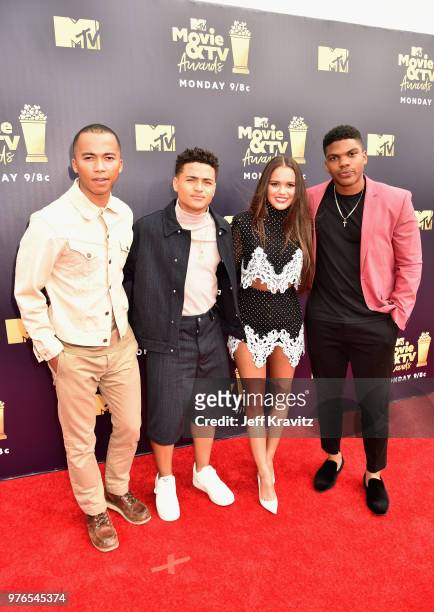 Actors Raymond Cham Jr, Nate Potvin, Madison Pettis, and Spence Moore II attend the 2018 MTV Movie And TV Awards at Barker Hangar on June 16, 2018 in...