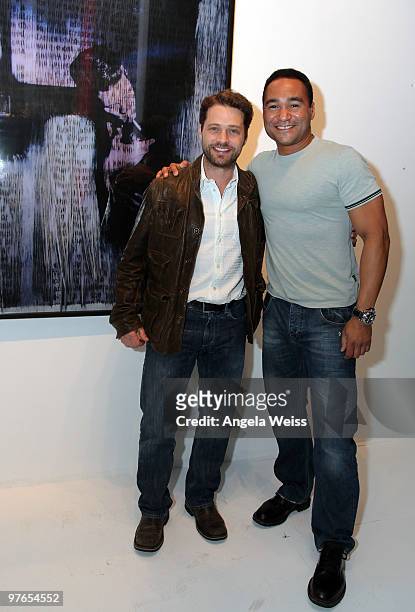 Actor Jason Priestly and photographer Paul Robinson attend the opening night reception of Paul Robinson's 'Transparent' at Sunset Millenium on March...