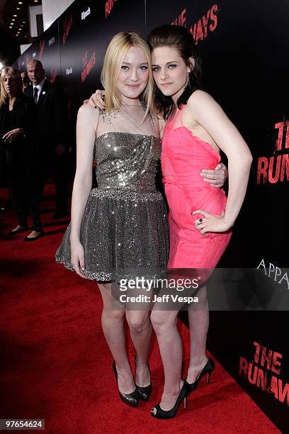 Actresses Dakota Fanning and Kristen Stewart arrive at the Los Angeles Premiere of The Runaways presented by Apparition and KLIPSCH at ArcLight...