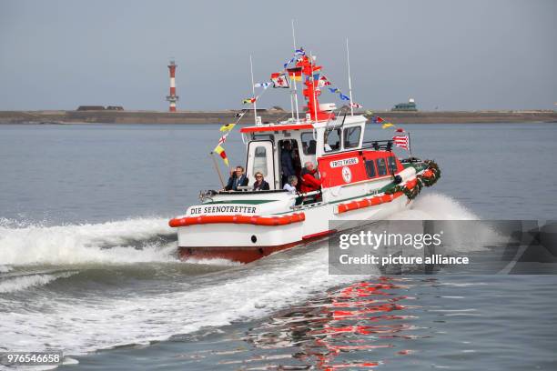 April 2018, Germany, Wangerooge: After the launching ceremony of the new marine rescue boat 'FRITZ THIEME', special guests are taken on a tour off...