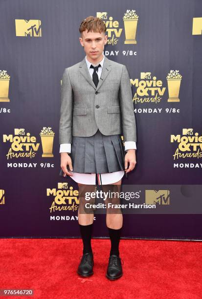 Actor Tommy Dorfman attends the 2018 MTV Movie And TV Awards at Barker Hangar on June 16, 2018 in Santa Monica, California.