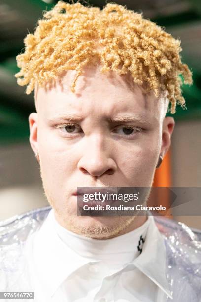 American albino model Shaun Ross is seen backstage ahead of the Marcelo Burlon County Of Milan show during Milan Men's Fashion Week Spring/Summer...