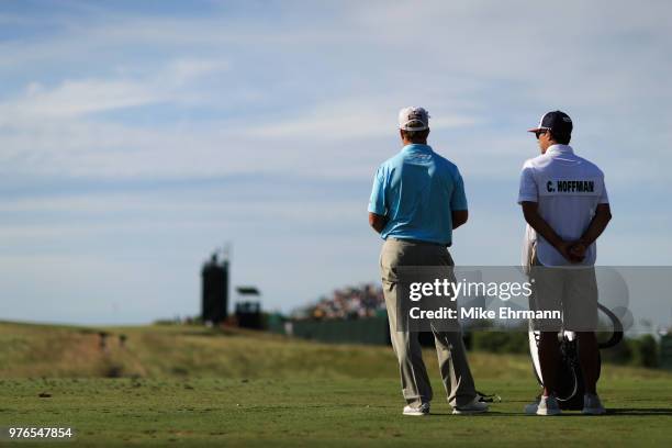 Charley Hoffman of the United States and caddie Brett Waldman look on from the 11th tee during the third round of the 2018 U.S. Open at Shinnecock...