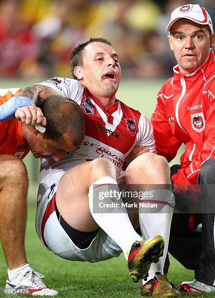 Nathan Fien of the Dragons is taken from the field with a leg injury during the round one NRL match between the Parramatta Eels and the St George...