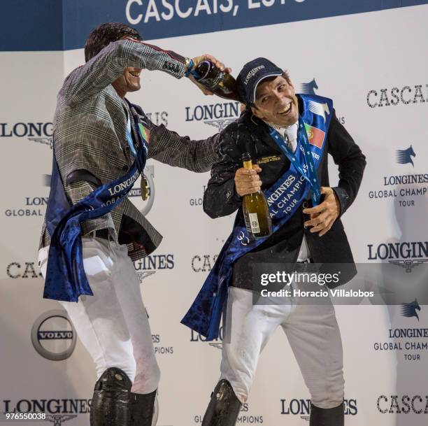 Winner Nicola Philippaerts jubilates with champagne with Eduardo Alvarez Aznar at the end of the awards ceremony of "CSI 5" Longines Global Champions...