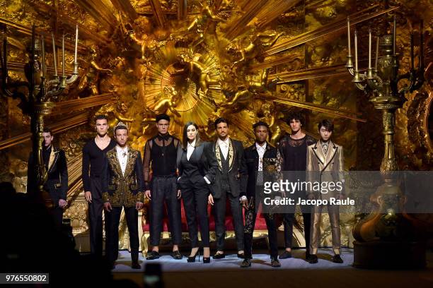 Cameron Dallas, Monica Bellucci and Kailand Wonder walk the runway at the Dolce & Gabbana show during Milan Men's Fashion Week Spring/Summer 2019 on...