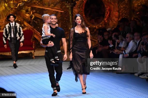 David Palacios Enrique Palcios and Veronica Schneider walk the runway at the Dolce & Gabbana show during Milan Men's Fashion Week Spring/Summer 2019...