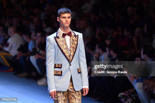 Model walks the runway at the Dolce & Gabbana show during Milan Men's Fashion Week Spring/Summer 2019 on June 16, 2018 in Milan, Italy.