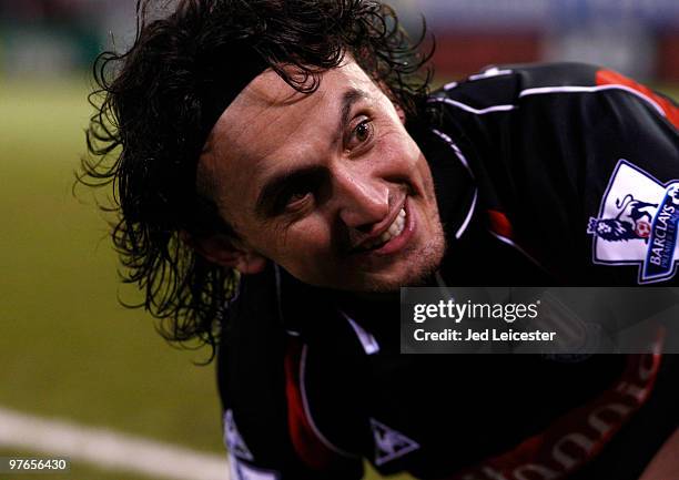 Tuncay Sanli of Stoke City smiles during the Barclays Premier League match between Burnley and Stoke City at Turfmoor Ground on March 10, 2010 in...