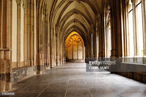 medieval monastery corridor - monastery stock pictures, royalty-free photos & images