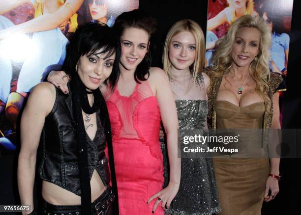 Musician Joan Jett, actress Kristen Stewart, actress Dakota Fanning and musician Cherie Currie arrive at the Los Angeles Premiere of The Runaways...