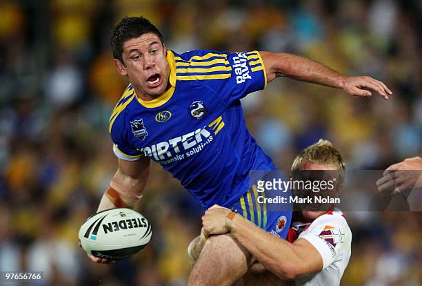 Nathan Cayless of the Eels looks to offload during the round one NRL match between the Parramatta Eels and the St George Illawarra Dragons at...