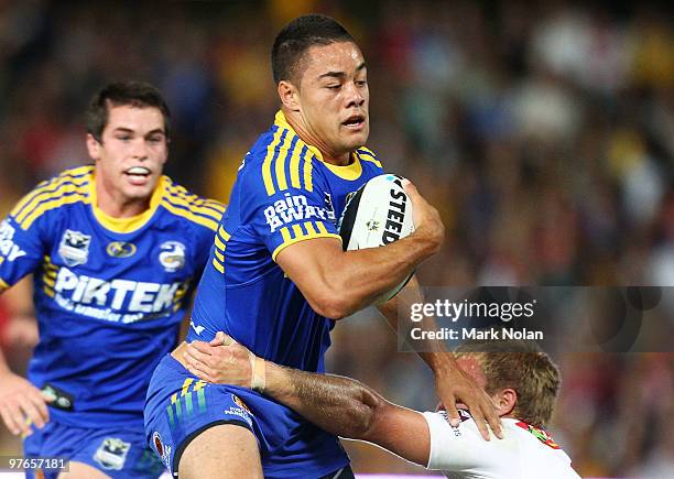 Jarryd Hayne of the Eels is tackled during the round one NRL match between the Parramatta Eels and the St George Illawarra Dragons at Parramatta...