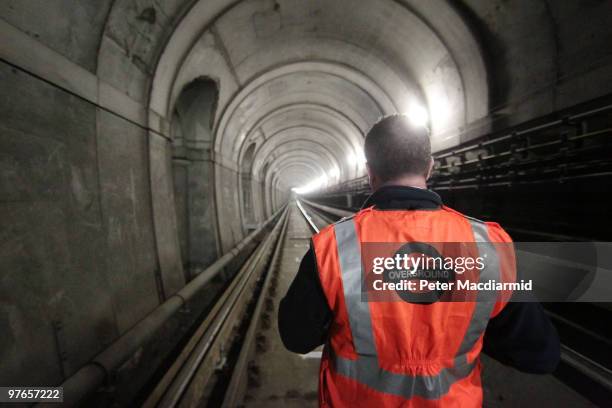 Railway worker walks through the Thames Tunnel on March 12, 2010 in London, England. The tunnel was built by Marc and Isambard Kingdom Brunel and...