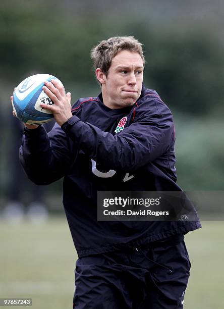 Jonny Wilkinson looks to pass during the England rugby union squad training session at Pennyhill Park on March 12, 2010 in Bagshot, England.