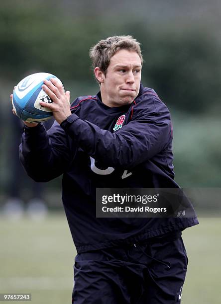 Jonny Wilkinson looks to pass during the England rugby union squad training session at Pennyhill Park on March 12, 2010 in Bagshot, England.