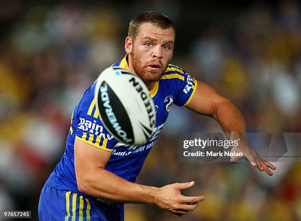 Matthew Keating of the Eels passes during the round one NRL match between the Parramatta Eels and the St George Illawarra Dragons at Parramatta...