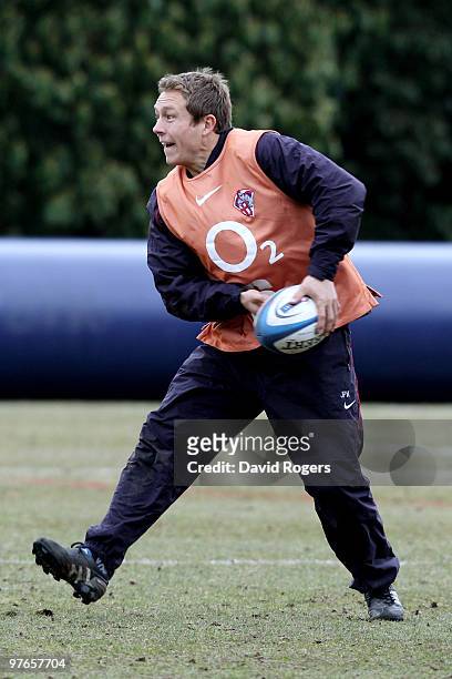 Jonny Wilkinson passes the ball during the England rugby union squad training session at Pennyhill Park on March 12, 2010 in Bagshot, England.