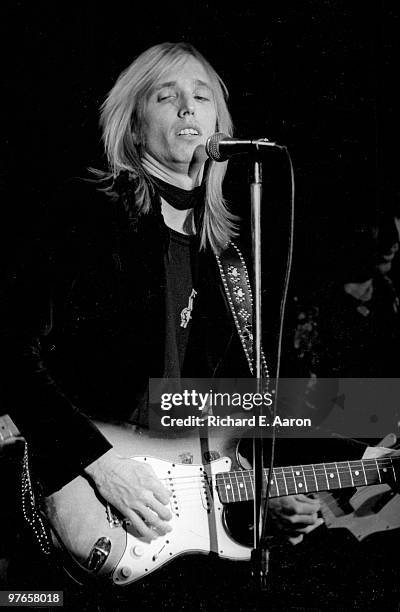 Tom Petty performs live on stage in New York in 1976