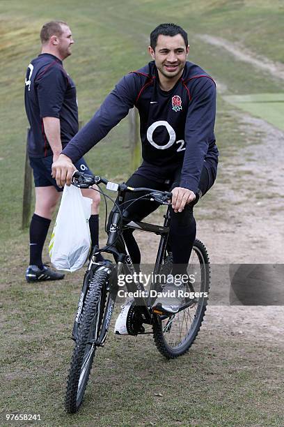 Centre Riki Flutey rides his mountain bike during the England rugby union squad training session at Pennyhill Park on March 12, 2010 in Bagshot,...