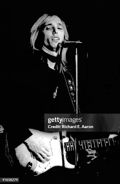 Tom Petty performs live on stage in New York in 1976