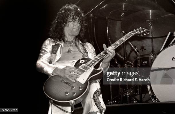 Jimmy Page from Led Zeppelin performs live on stage at Madison Square Garden, New York on June 07 1977