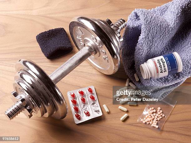 steroid drug abuse - exercise pill stock-fotos und bilder