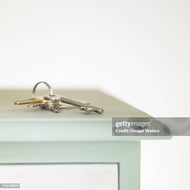bunch of keys on side board - side table stock pictures, royalty-free photos & images