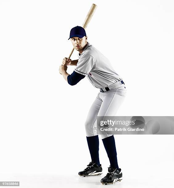 baseball player swinging bat - baseball strip stock pictures, royalty-free photos & images