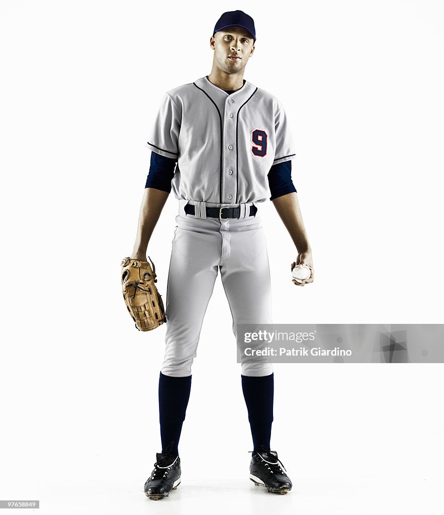 Baseball Player with glove and baseball