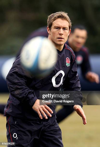 Jonny Wilkinson receives the ball during the England rugby union squad training session at Pennyhill Park on March 12, 2010 in Bagshot, England.