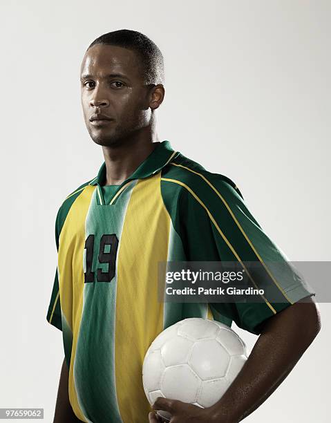 soccer player - black soccer player stock pictures, royalty-free photos & images
