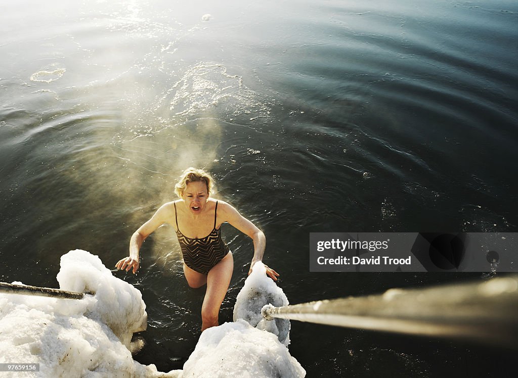 Woman winter bather during an early morning swim.