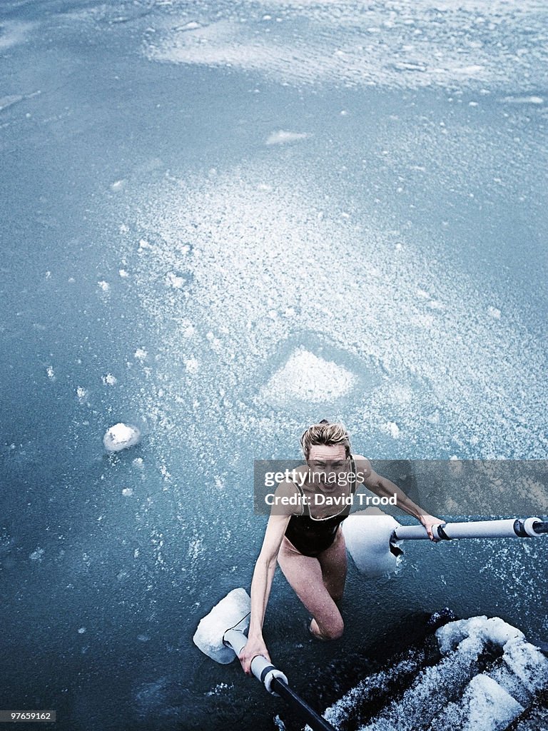 Woman bathing in icy sea.