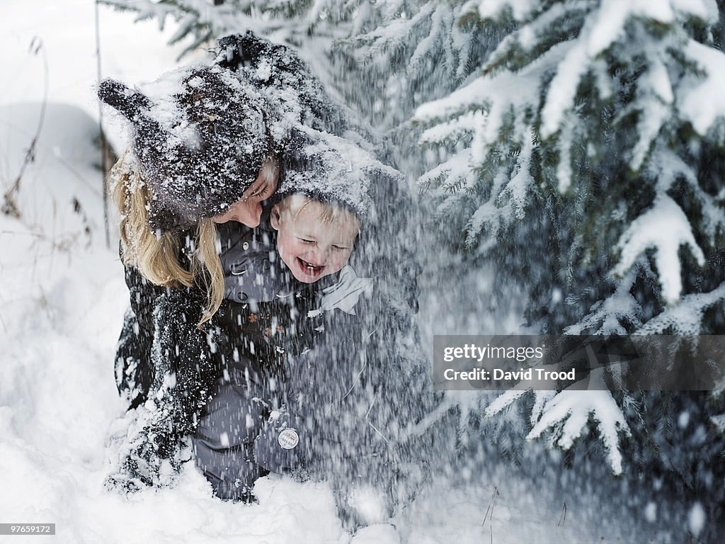 Mother and son in snowstorm