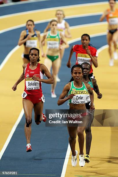 Meseret Defar of Ethiopia competes in the Womens 3000m heats during Day 1 of the IAAF World Indoor Championships at the Aspire Dome on March 12, 2010...