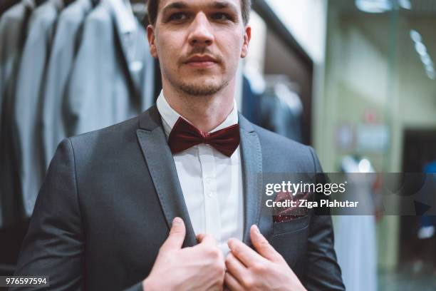 you can never go wrong with a suit - wrong size clothes stock pictures, royalty-free photos & images