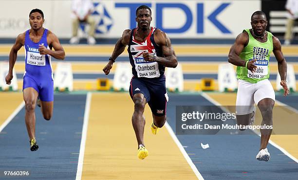 Dwain Chambers of Great Britain competes and wins his Mens 60m Heat during Day 1 of the IAAF World Indoor Championships at the Aspire Dome on March...